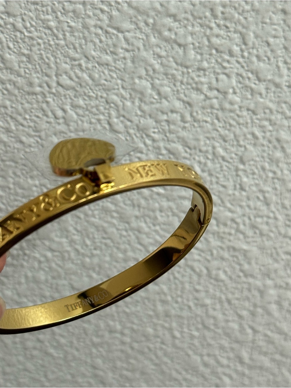 Gold-tone Bangle Bracelet with Heart Charm - Picture 2 of 2